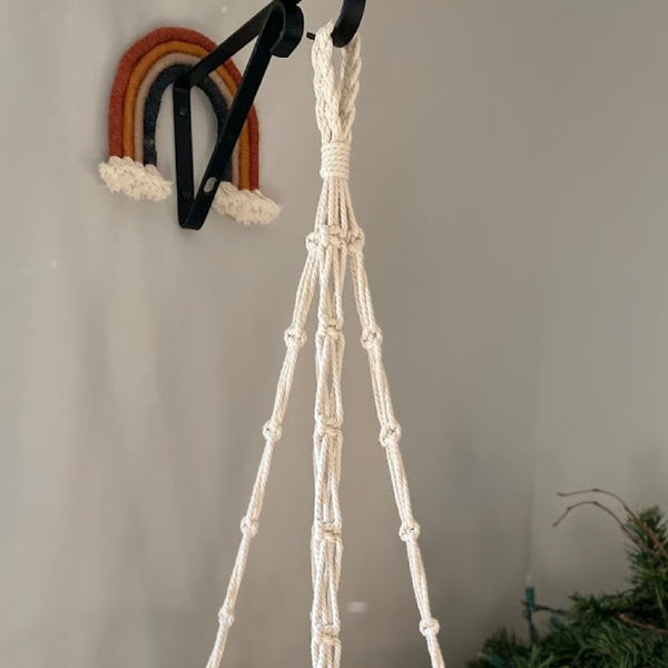 up close shot of the hanging loop of the macrame hanging basket